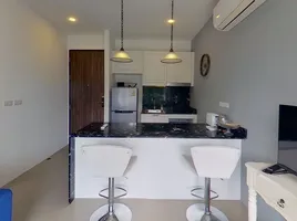 1 Schlafzimmer Wohnung zu verkaufen im Palmyrah Surin Beach Residence, Choeng Thale, Thalang, Phuket