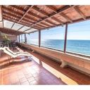 Large beachfront condo with open terrace!