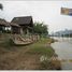 ເຮືອນ 2 ຫ້ອງນອນ ຂາຍ ໃນ , ວຽງຈັນ Holiday home on island of Namsong River near city, Vangvieng for sale.