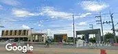 Vista de la calle of Ease Ville Wellgrow-Onnut
